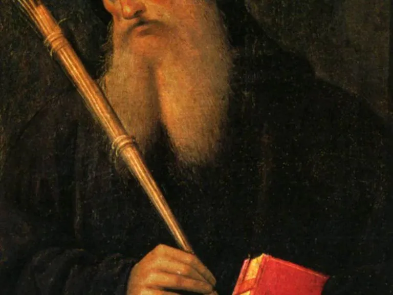 Obraz Pietra Perugina: św. Benedykt w czarnym habicie z kapturem i nimbem, z długą siwą brodą, trzyma wiązkę rózg i czerwoną księgę