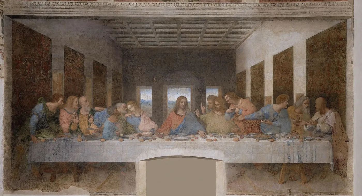 Ostatnia Wieczerza — Chrystus pośrodku długiego stołu z dwunastoma apostołami; fresk Leonarda da Vinci z lat 1495–1498 w Mediolanie