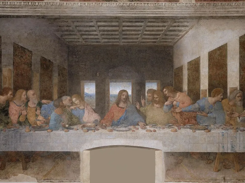 Ostatnia Wieczerza — Chrystus pośrodku długiego stołu z dwunastoma apostołami; fresk Leonarda da Vinci z lat 1495–1498 w Mediolanie