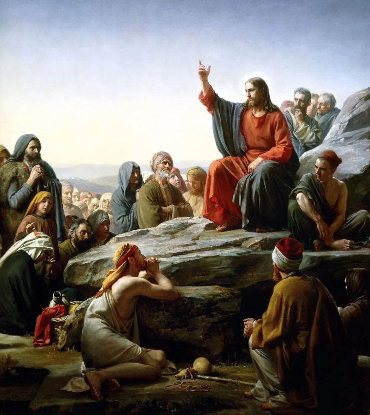 Jezus nauczający zgromadzone tłumy na wzgórzu, wskazujący gestem ku niebu — obraz „Kazanie na Górze” Carla Blocha