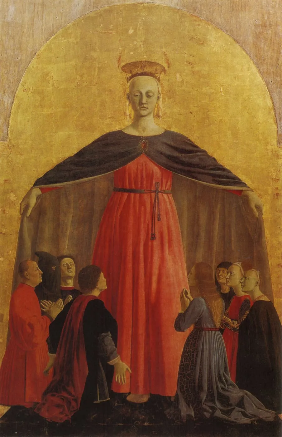 Madonna Miłosierdzia — Maryja z rozpostartym płaszczem, pod którym klęczą modlący się wierni; obraz Piera della Francesca z XV wieku