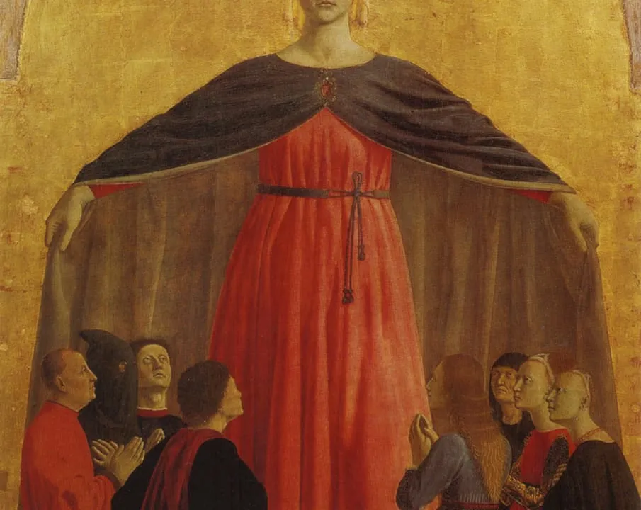 Madonna Miłosierdzia — Maryja z rozpostartym płaszczem, pod którym klęczą modlący się wierni; obraz Piera della Francesca z XV wieku